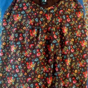 Floral tank top. NWOT